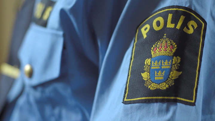 Närbild på en polisuniform